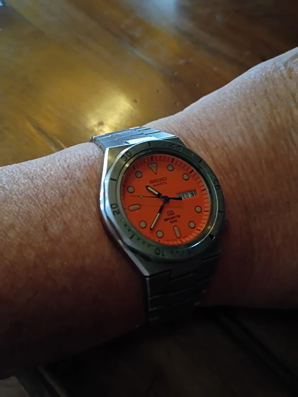 Seiko Quartz Sports 100 Stainless Watch — Orange Dial